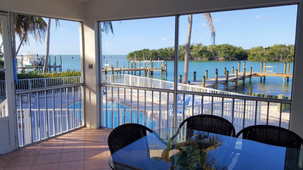 A Rare Beach Home with Sandy Beach At Door. A Rare Beach Home with Sandy Beach At Door.